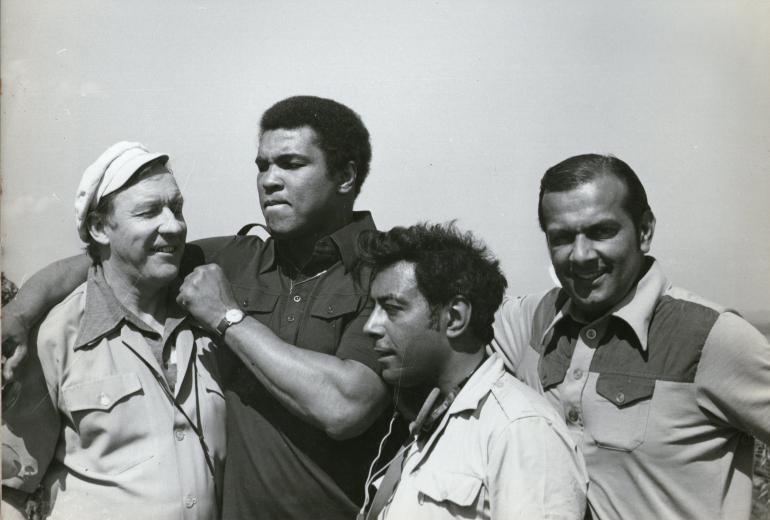From left to right: Rory McLeod chief cameraman, Muhammad Ali, Eric Chohan, head sound recordist, Reginald Massey, Producer - Director of Bangladesh I Love You. 1978