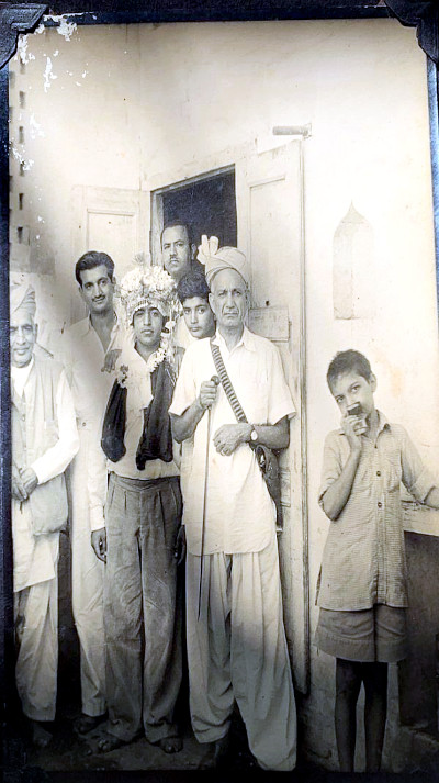 My grandfather on right with stick in his hand, Harbans Lal Banga (my uncle) second from left, Lachman Das Ratra (my father’s maternal uncle) wearing Sehra. Bannu. Circa 1940.