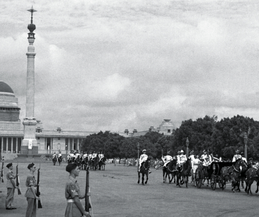 The ceremonial carriage carrying Lord and Lady Mountbatten, flanked by the Governor-General's bodyguard.